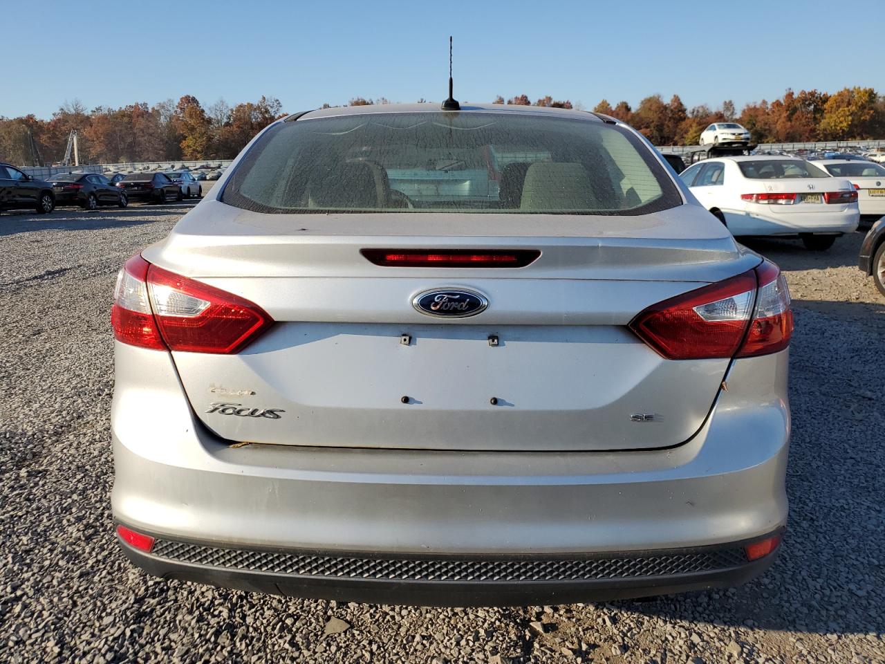 2014 Ford Focus Se VIN: 1FADP3F29EL159232 Lot: 77015174