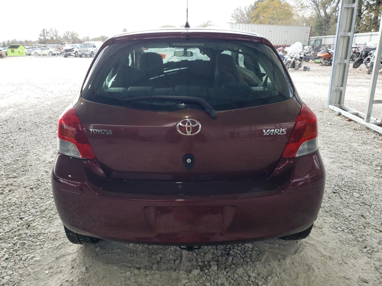 2009 Toyota Yaris VIN: JTDKT903095231561 Lot: 77163294