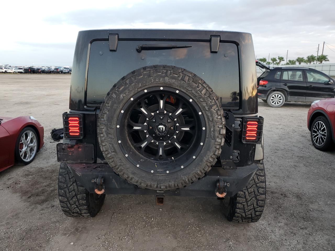 2014 Jeep Wrangler Unlimited Sahara VIN: 1C4BJWEGXEL254870 Lot: 74686704