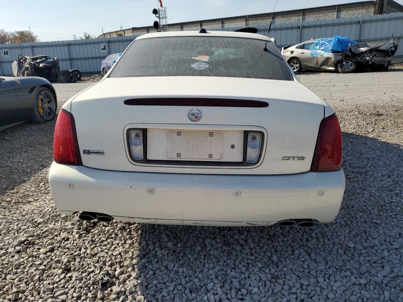 2004 Cadillac Deville Dts VIN: 1G6KF57994U180038 Lot: 77867254