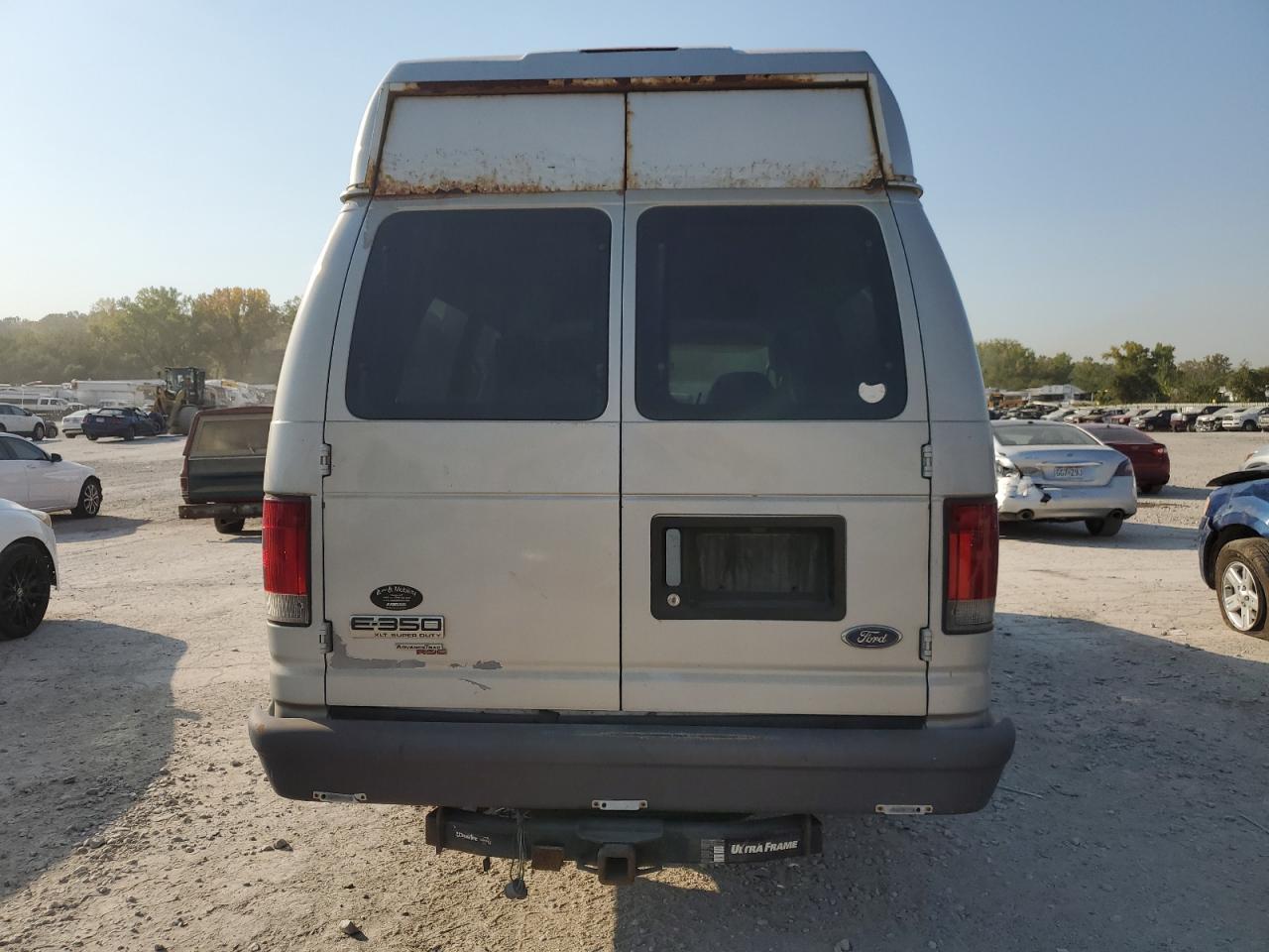 2006 Ford Econoline E350 Super Duty Wagon VIN: 1FBSS31L96DA90560 Lot: 75637684