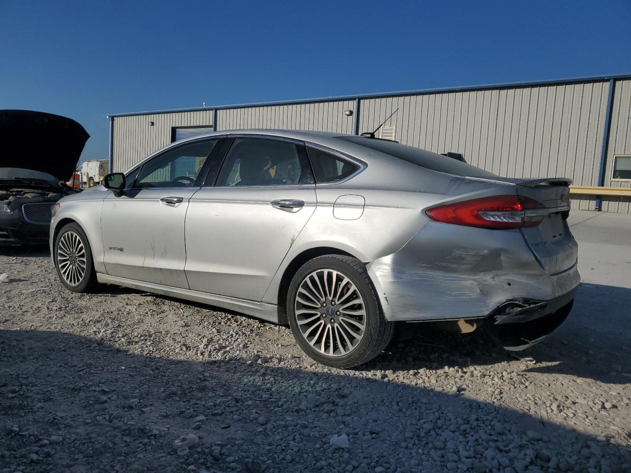 2017 Ford Fusion Titanium Hev VIN: 3FA6P0RU9HR323038 Lot: 75830684