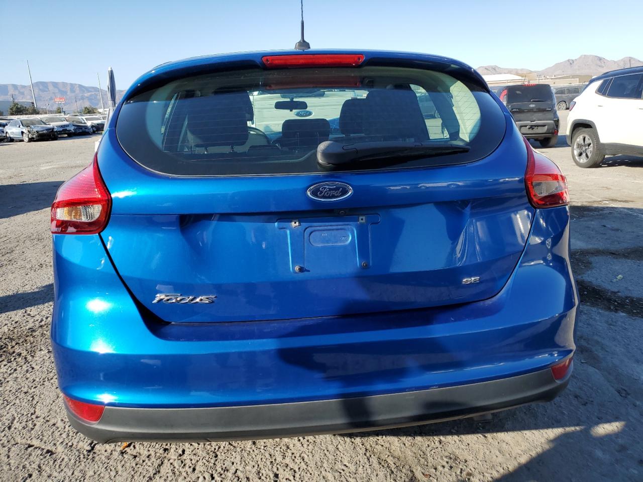 2018 Ford Focus Se VIN: 1FADP3K28JL250640 Lot: 74240104