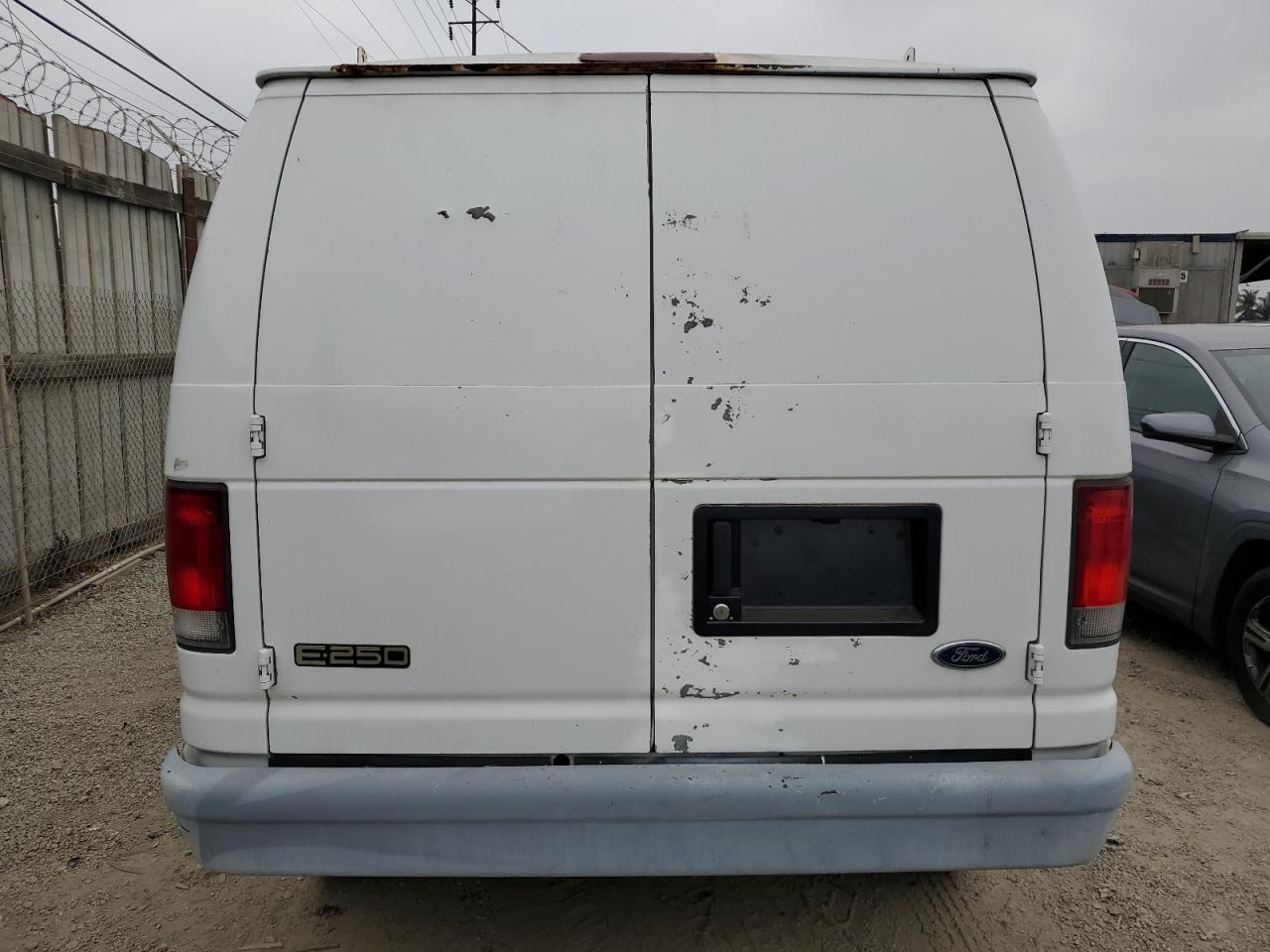 2000 Ford Econoline E250 Van VIN: 1FTNE2420YHA77284 Lot: 76518404