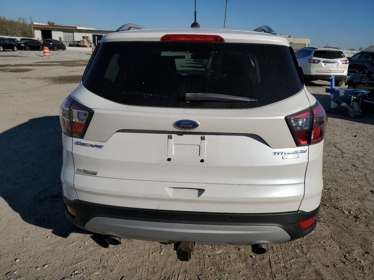 2017 Ford Escape Titanium VIN: 1FMCU0J96HUA63991 Lot: 76723674