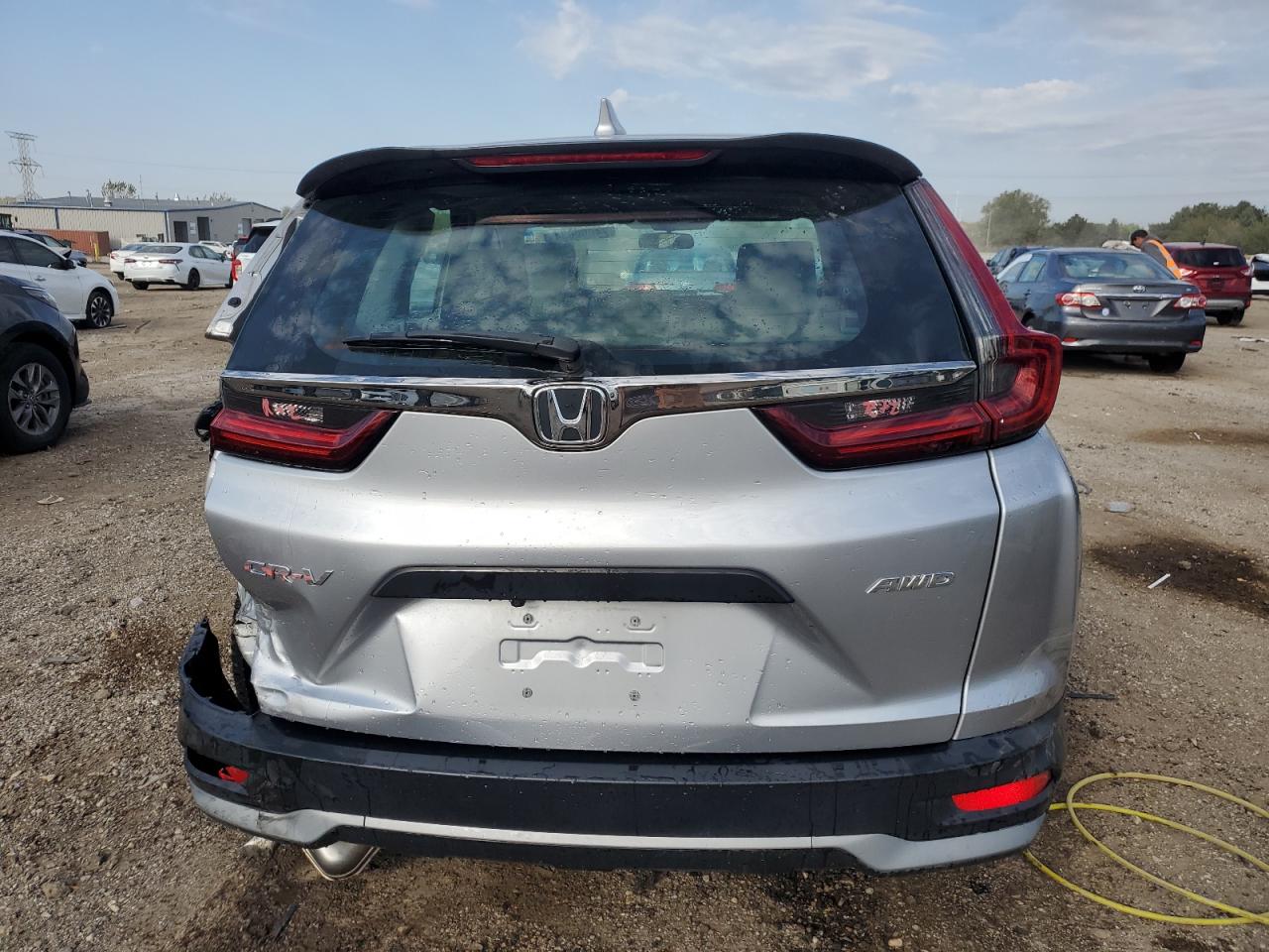 2020 Honda Cr-V Lx VIN: 2HKRW2H24LH611860 Lot: 74060634