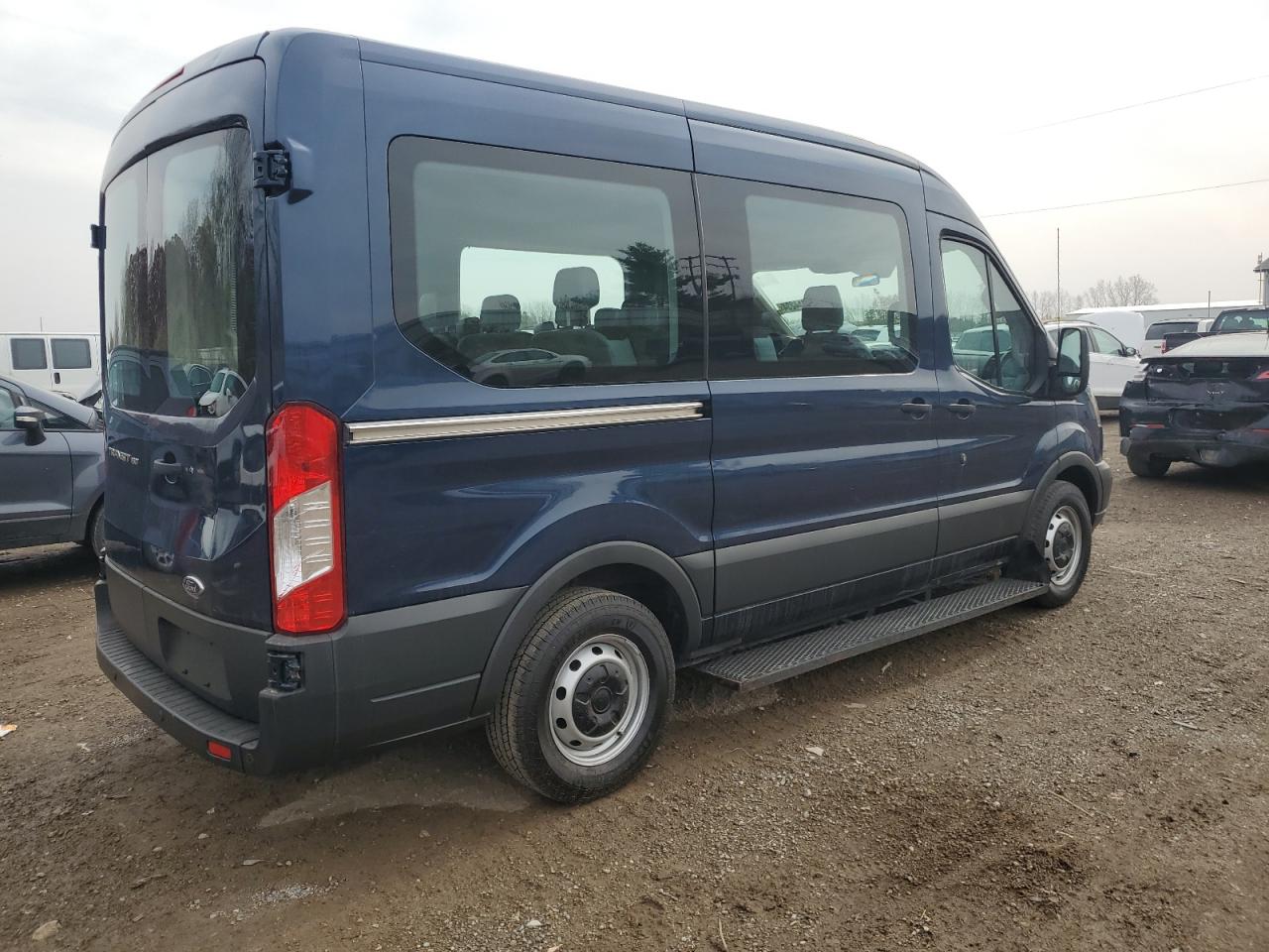 2015 Ford Transit T-150 VIN: 1FMZK1CM2FKB31879 Lot: 77944234