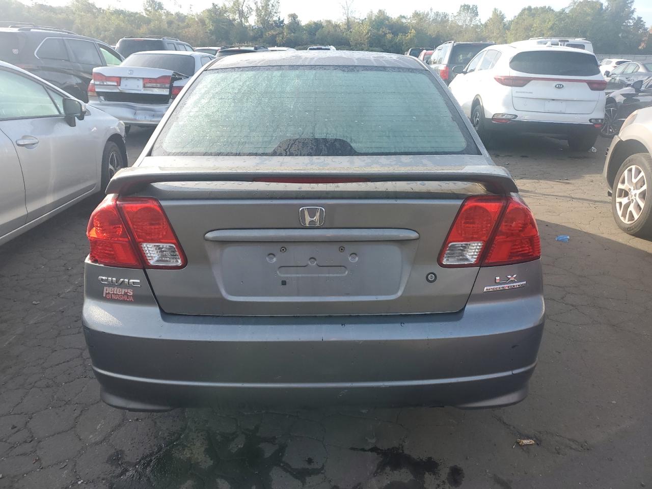 2HGES16575H580876 2005 Honda Civic Lx