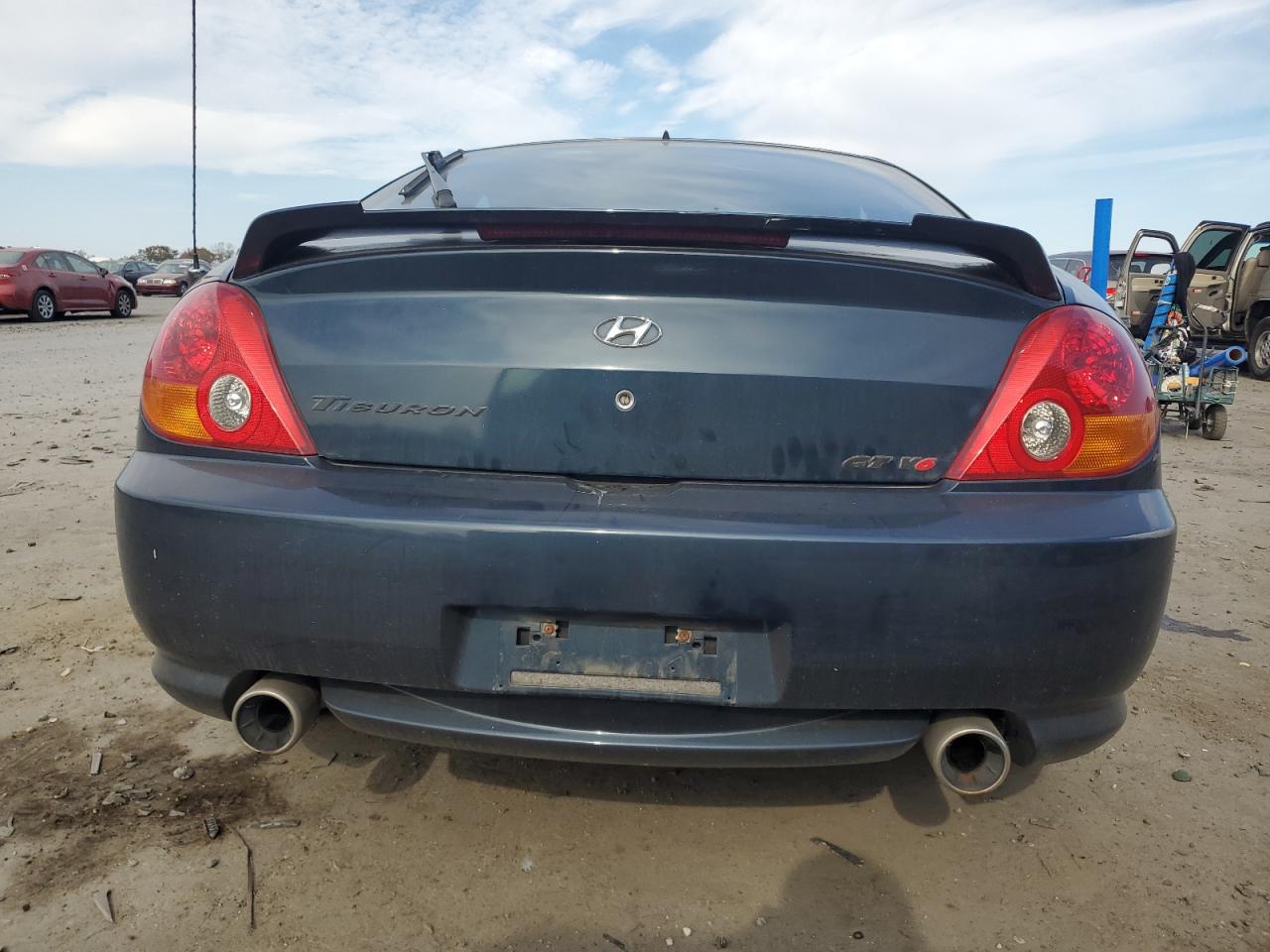 2003 Hyundai Tiburon Gt VIN: KMHHN65F53U061177 Lot: 78029034