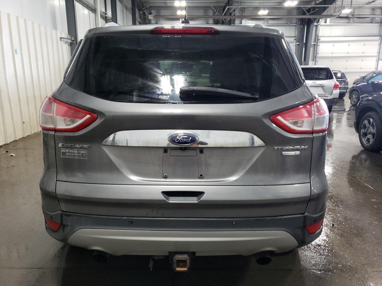 2014 Ford Escape Titanium VIN: 1FMCU9J99EUA13702 Lot: 76989414