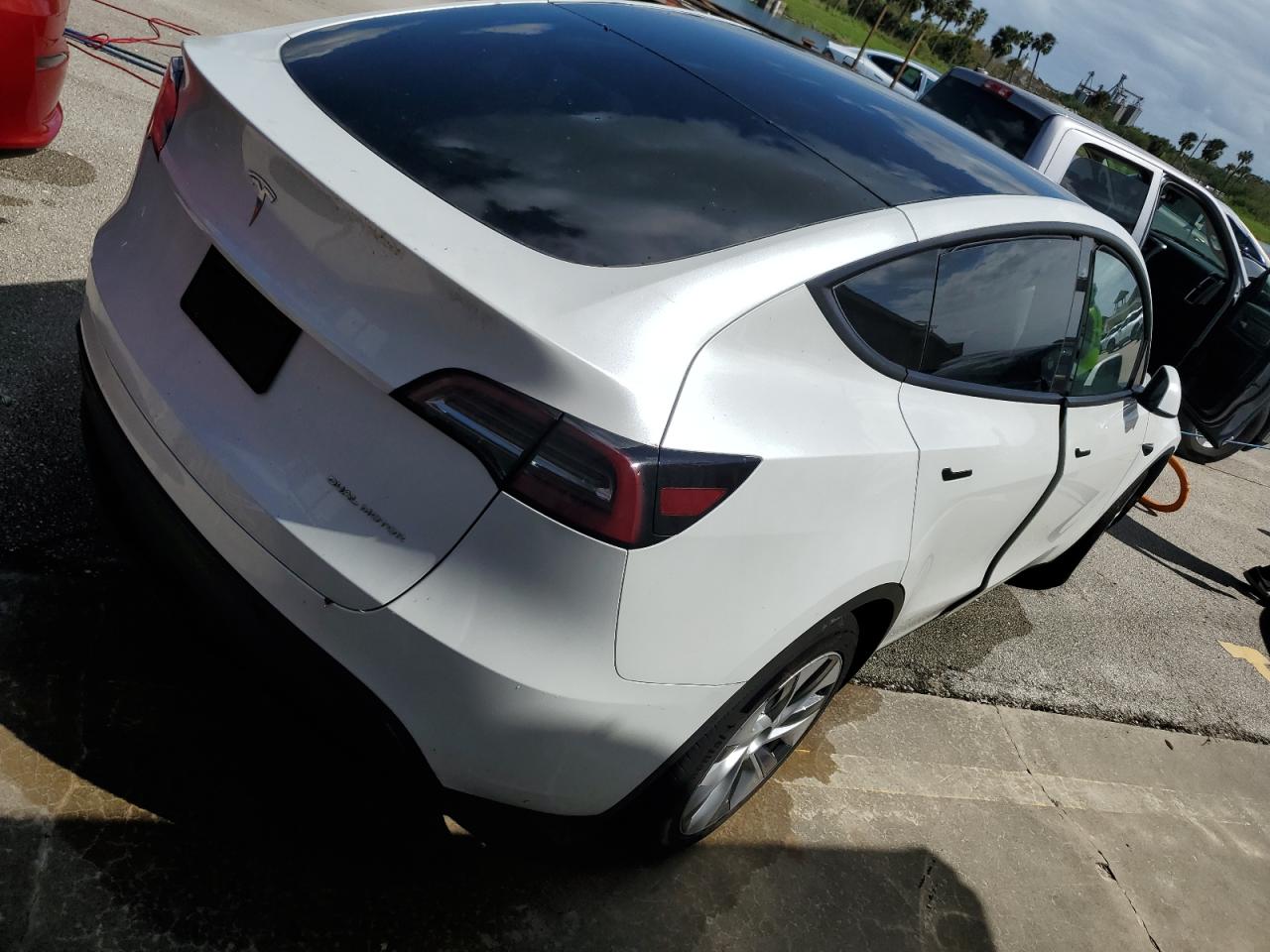 2023 Tesla Model Y VIN: 7SAYGDEE0PA099585 Lot: 73870184