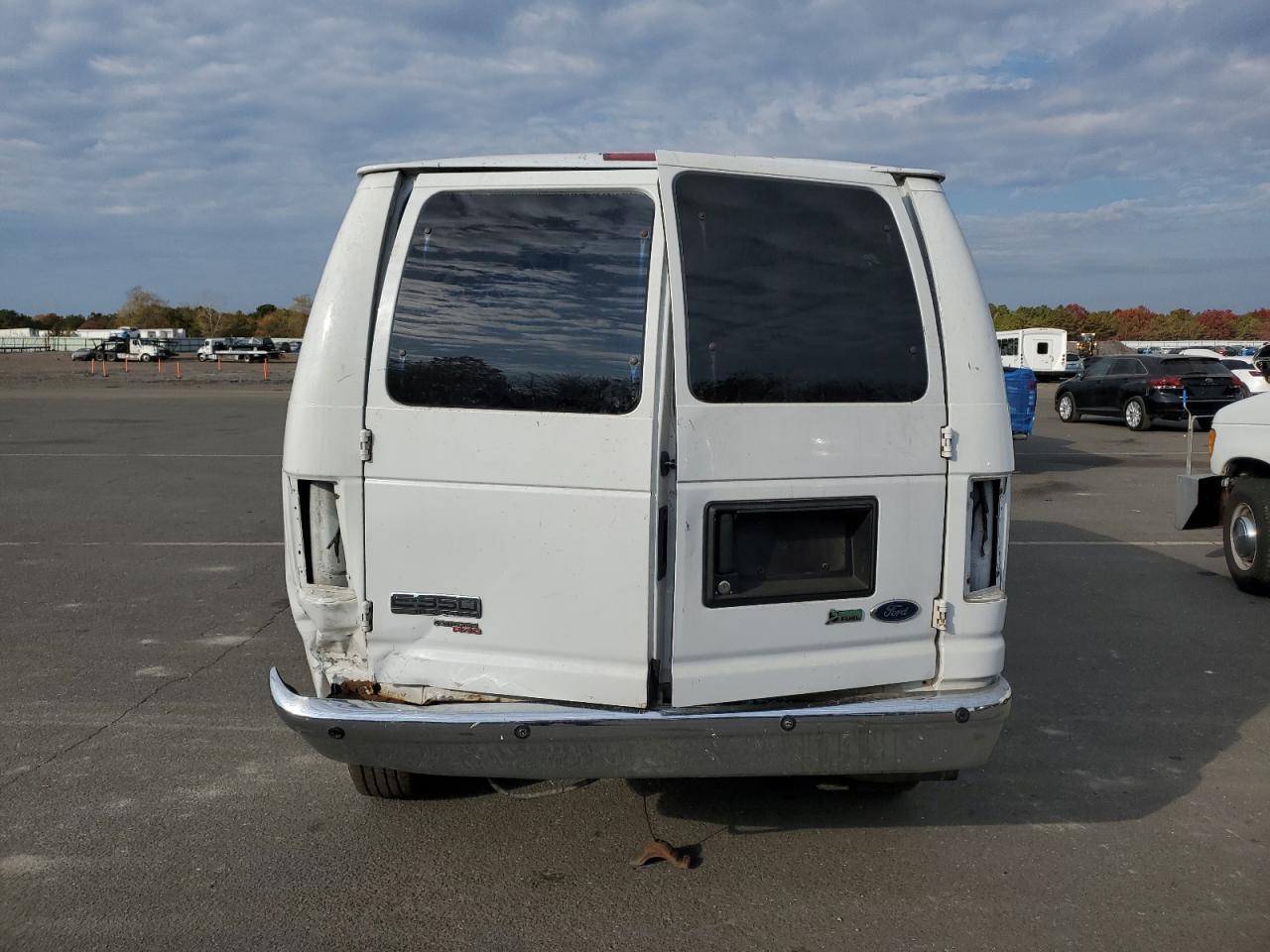 2009 Ford Econoline E350 Super Duty Wagon VIN: 1FBNE31L59DA60450 Lot: 77677774