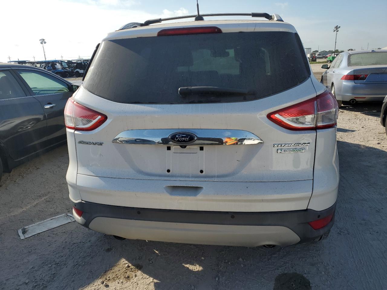 2014 Ford Escape Titanium VIN: 1FMCU0J91EUB69499 Lot: 74312774
