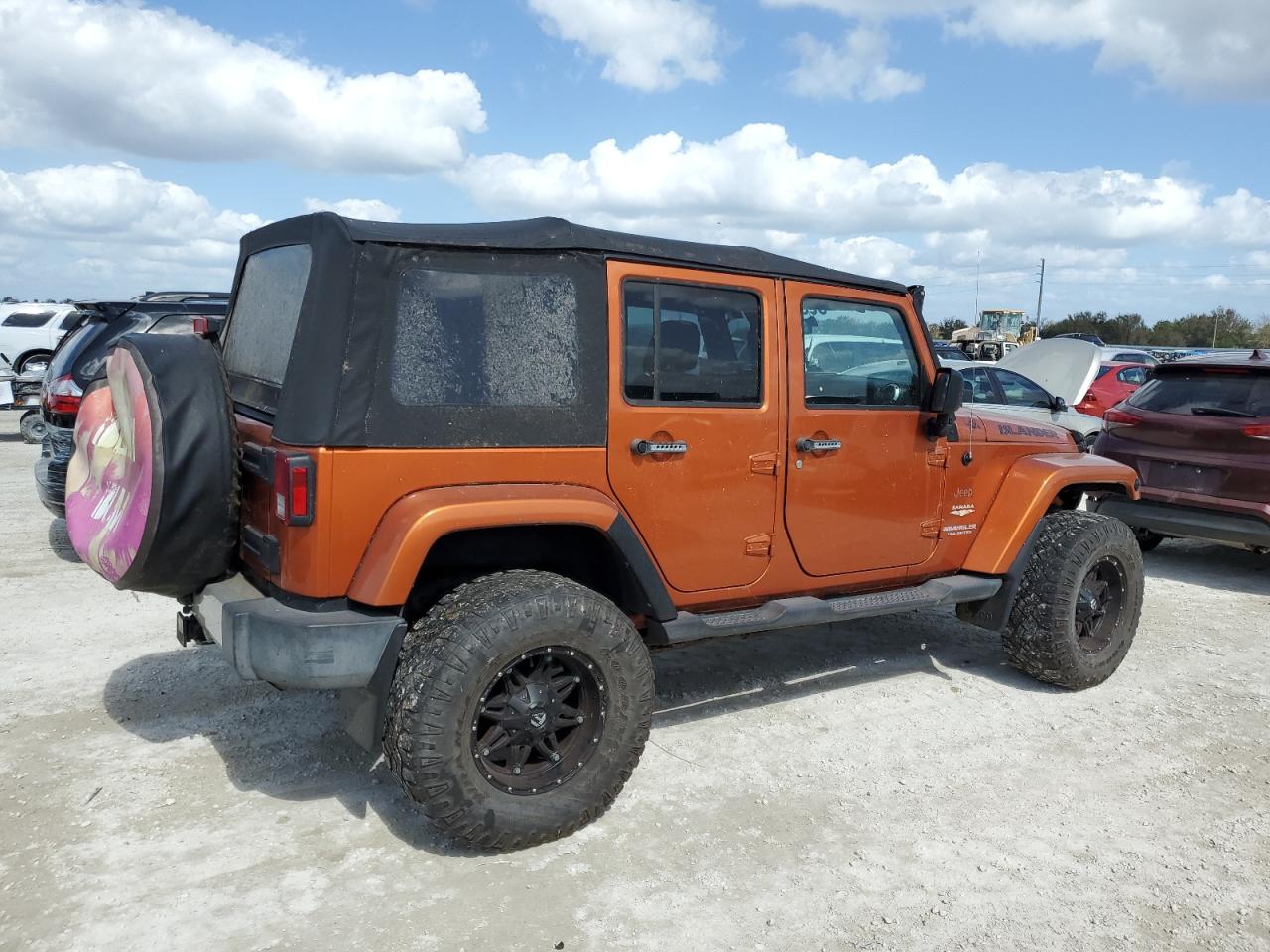 2011 Jeep Wrangler Unlimited Sahara VIN: 1J4BA5H10BL618334 Lot: 78225944