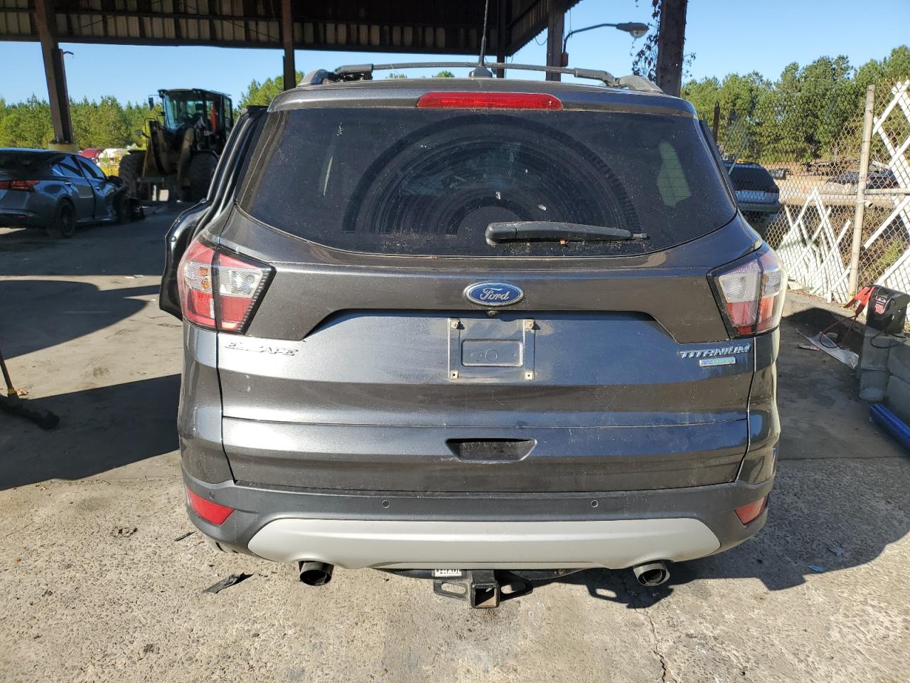 2018 Ford Escape Titanium VIN: 1FMCU0J99JUB67302 Lot: 73644054