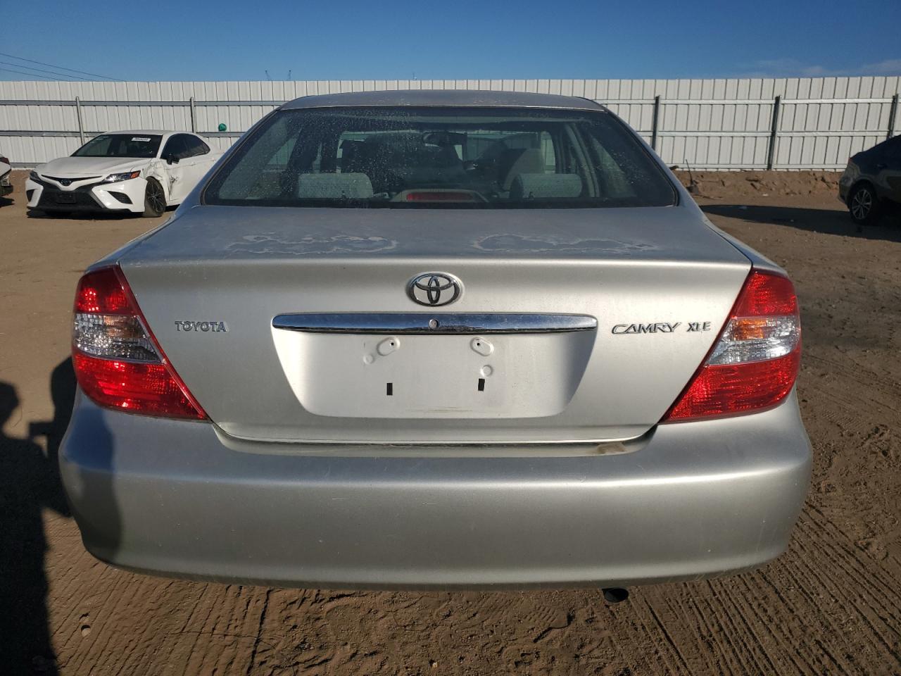 2003 Toyota Camry Le VIN: 4T1BE32K93U704149 Lot: 76617384