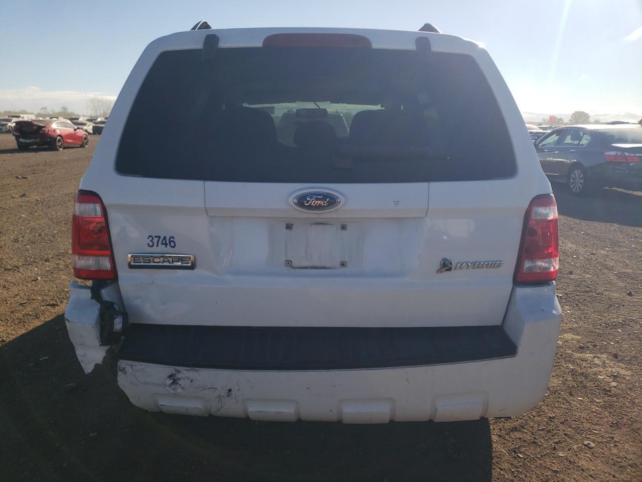 2009 Ford Escape Hybrid VIN: 1FMCU59359KA71297 Lot: 74962574