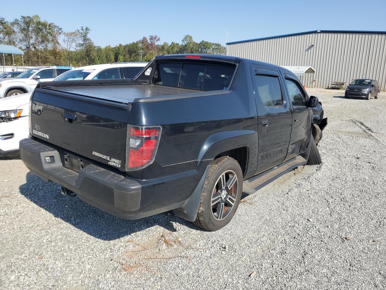 2014 Honda Ridgeline Sport VIN: 5FPYK1F75EB010627 Lot: 73995394