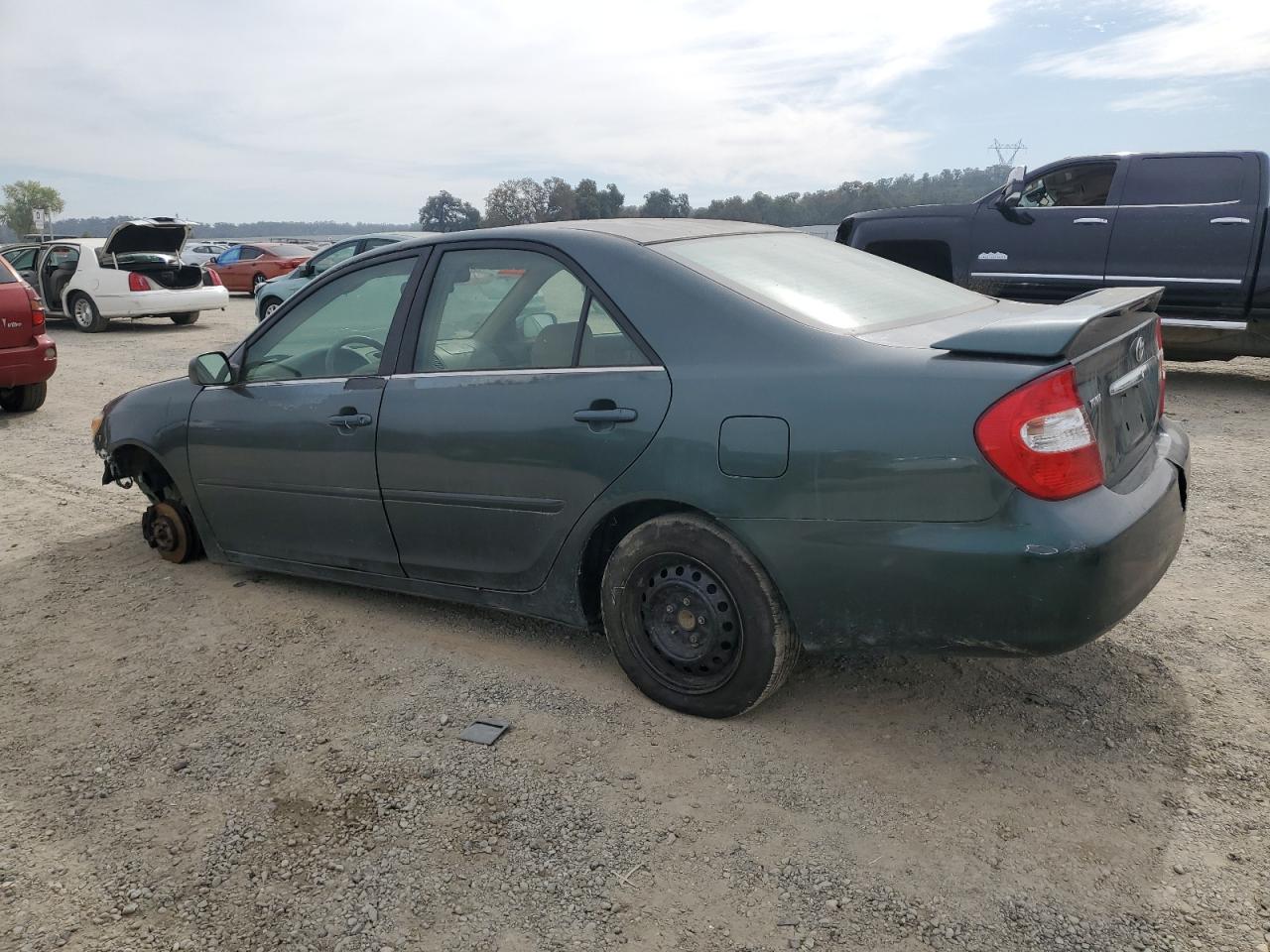 2002 Toyota Camry Le VIN: JTDBE32K820065269 Lot: 73583644