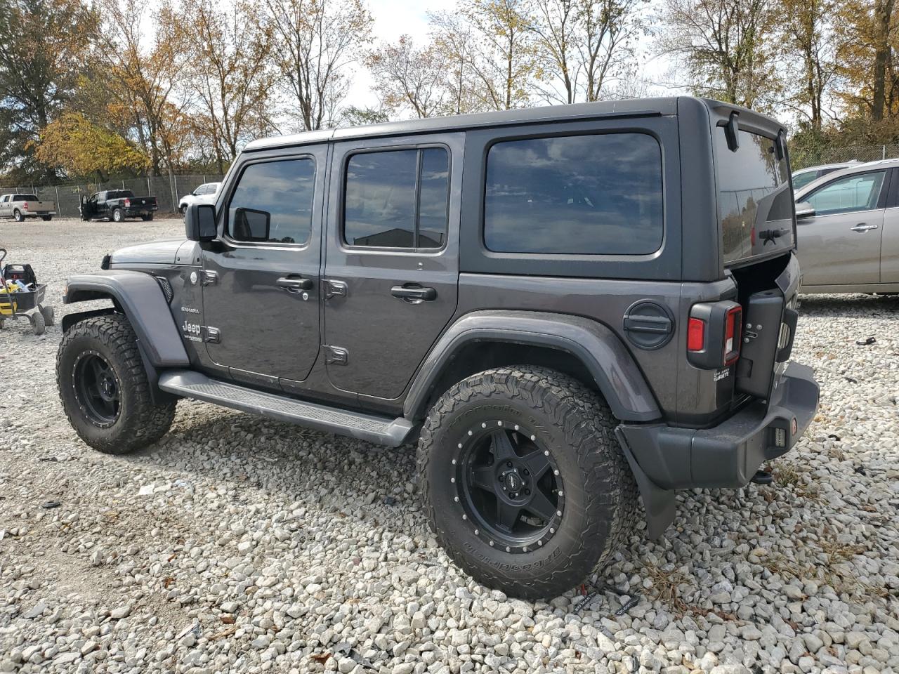 2018 Jeep Wrangler Unlimited Sahara VIN: 1C4HJXENXJW325802 Lot: 76881814