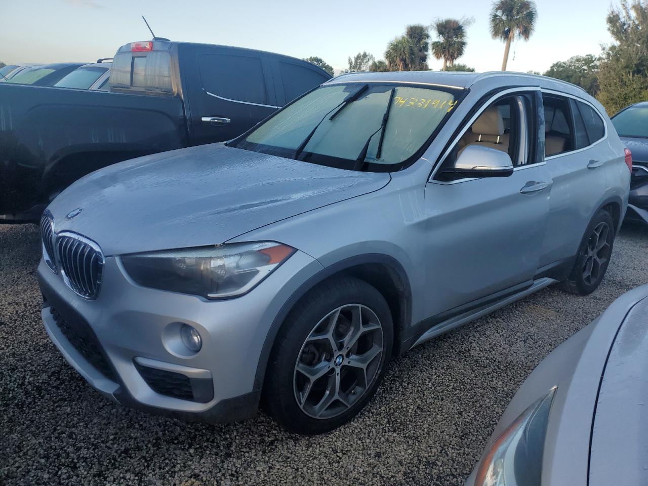 WBXHU7C37J5L06304 2018 BMW X1 - Image 1