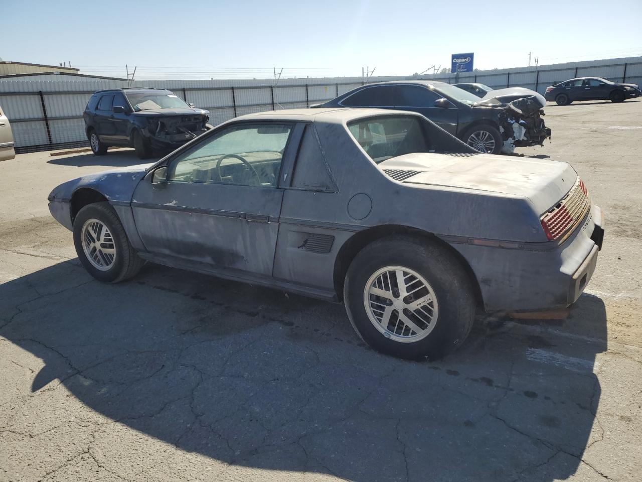 1986 Pontiac Fiero Sport VIN: 1G2PM37R2FP239143 Lot: 77043474