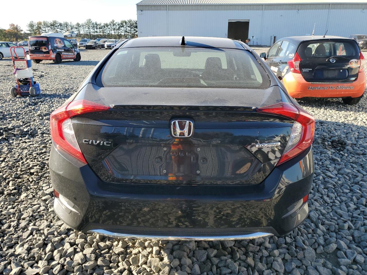 2019 Honda Civic Touring VIN: 19XFC1F99KE202374 Lot: 74709094