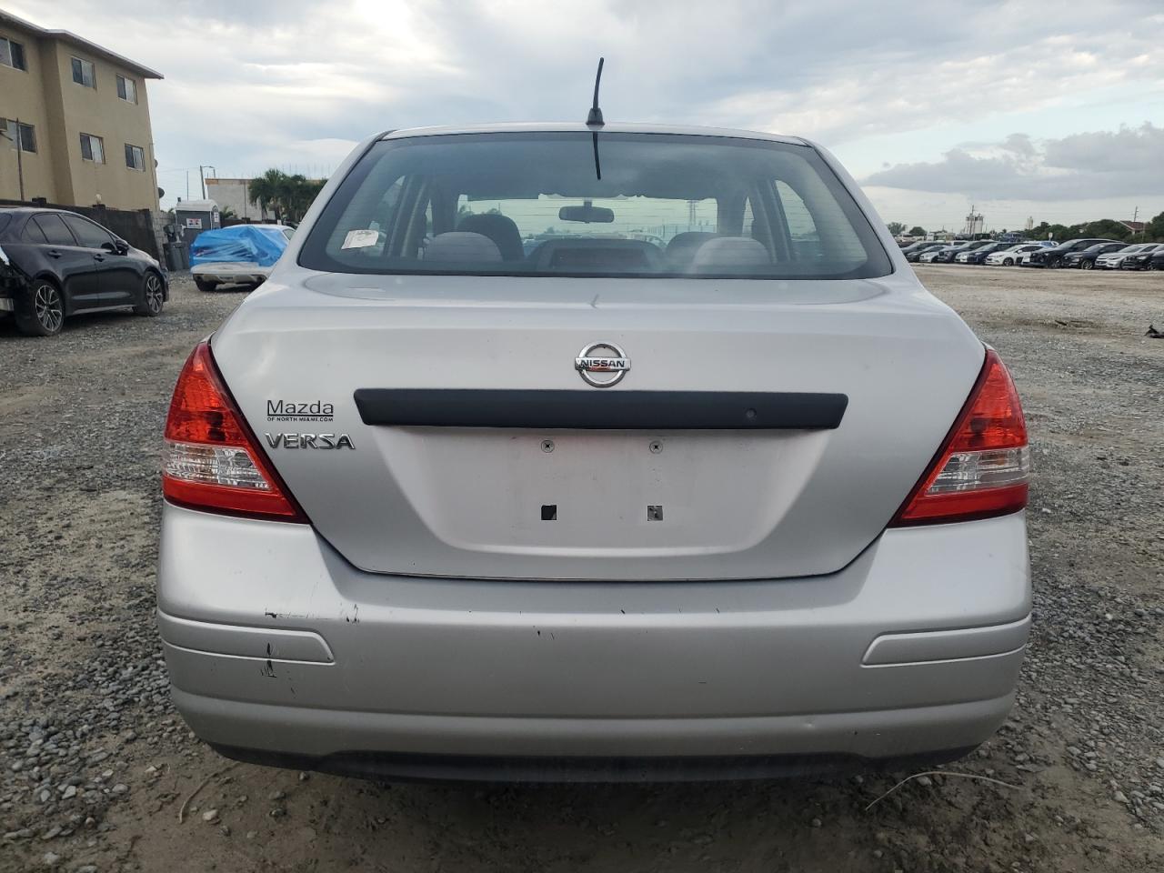 2009 Nissan Versa S VIN: 3N1CC11E69L446600 Lot: 77987974