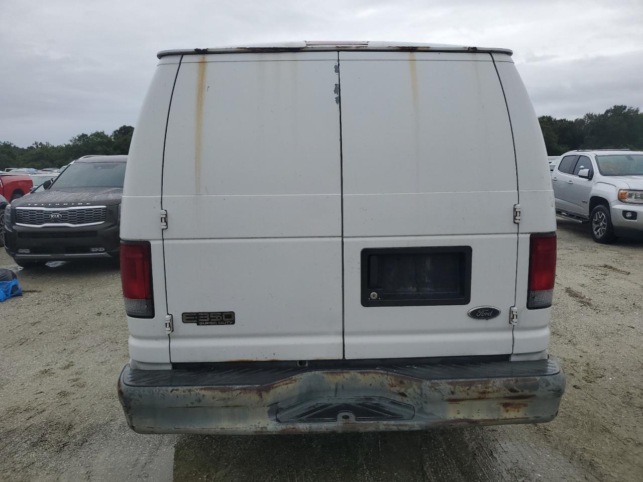 2004 Ford Econoline E350 Super Duty Van VIN: 1FTSE34L94HB46470 Lot: 75060474