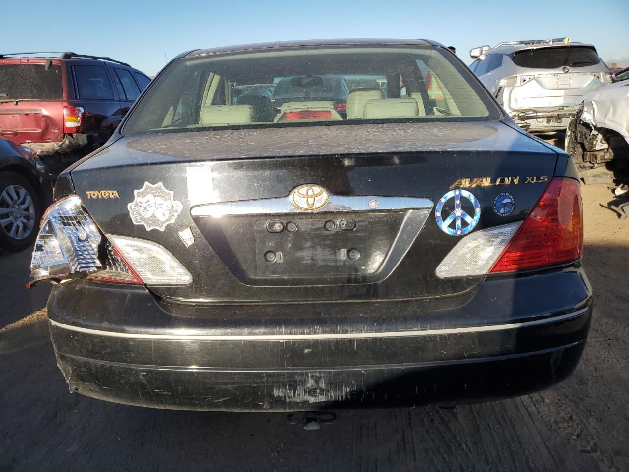 2000 Toyota Avalon Xl VIN: 4T1BF28B7YU105918 Lot: 77154784