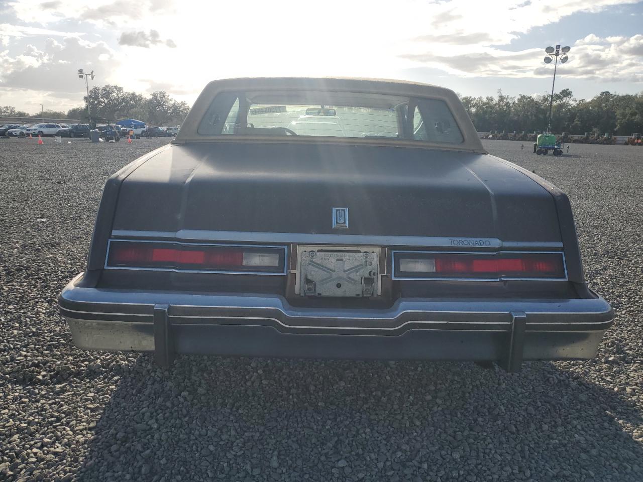 1985 Oldsmobile Toronado Brougham VIN: 1G3EZ57Y6FE321802 Lot: 77305454