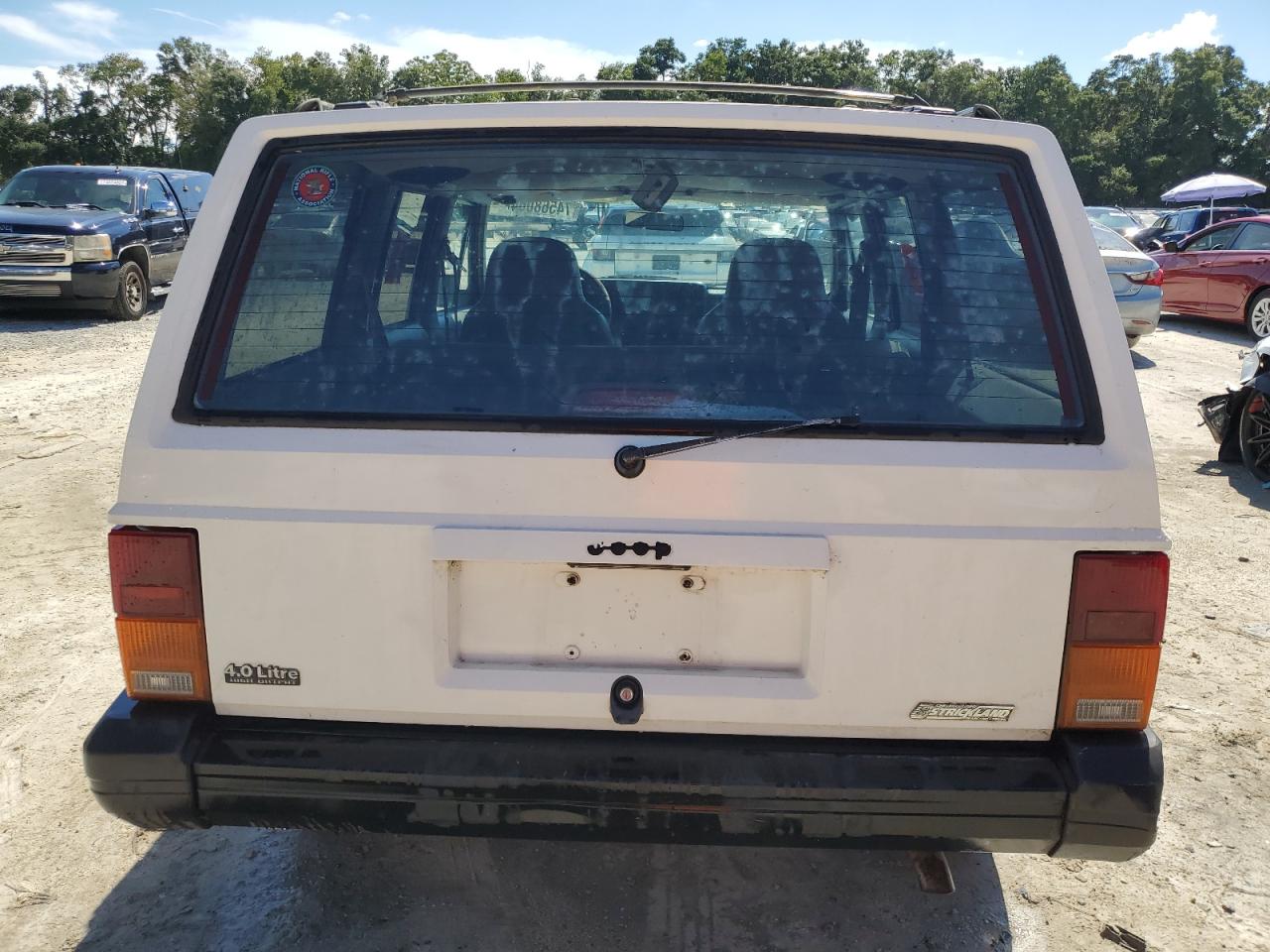 1996 Jeep Cherokee Sport VIN: 1J4FT68S4TL131956 Lot: 74568064