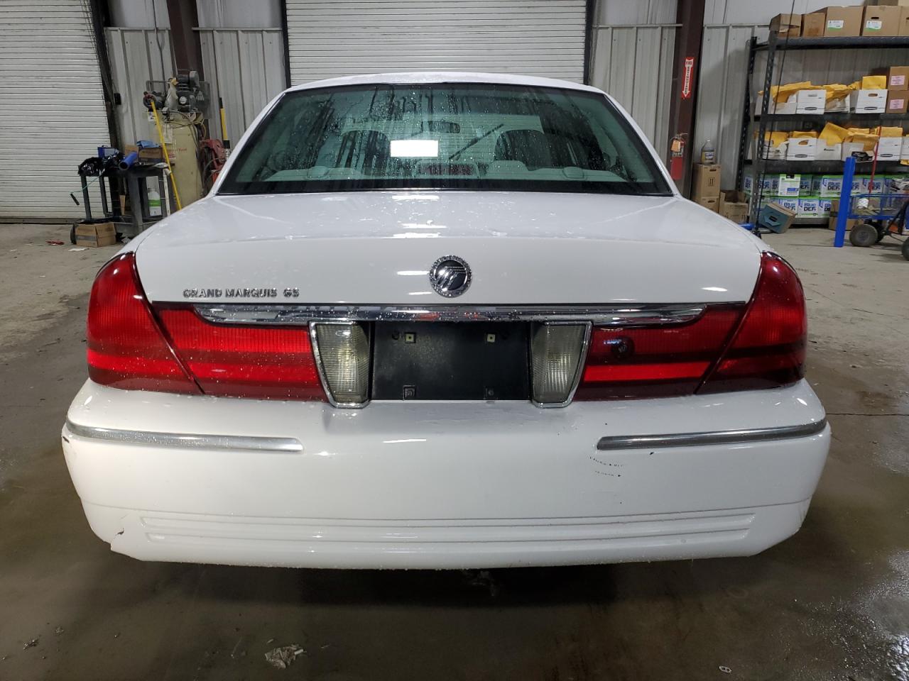 2005 Mercury Grand Marquis Gs VIN: 2MEFM74W05X661895 Lot: 75527114