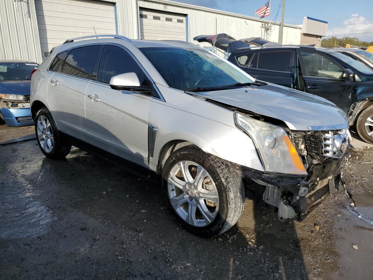 VIN 3GYFNDE3XDS594434 2013 CADILLAC SRX no.4