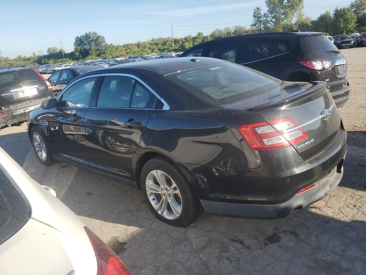 2014 Ford Taurus Sel VIN: 1FAHP2E8XEG113421 Lot: 74004124