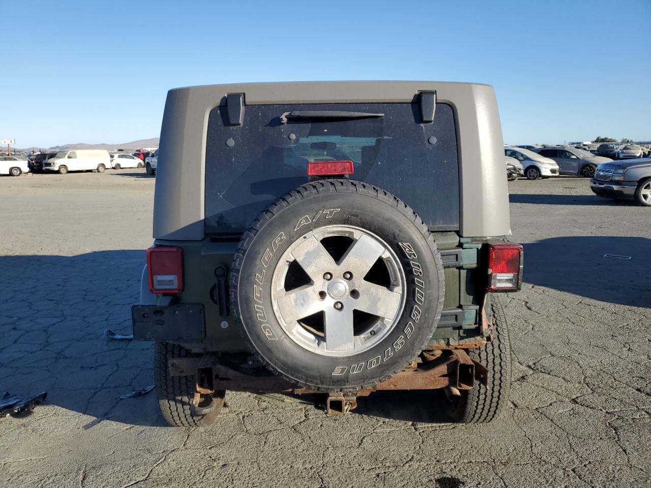 2009 Jeep Wrangler Unlimited Sahara VIN: 1J4GA59159L710764 Lot: 75525834