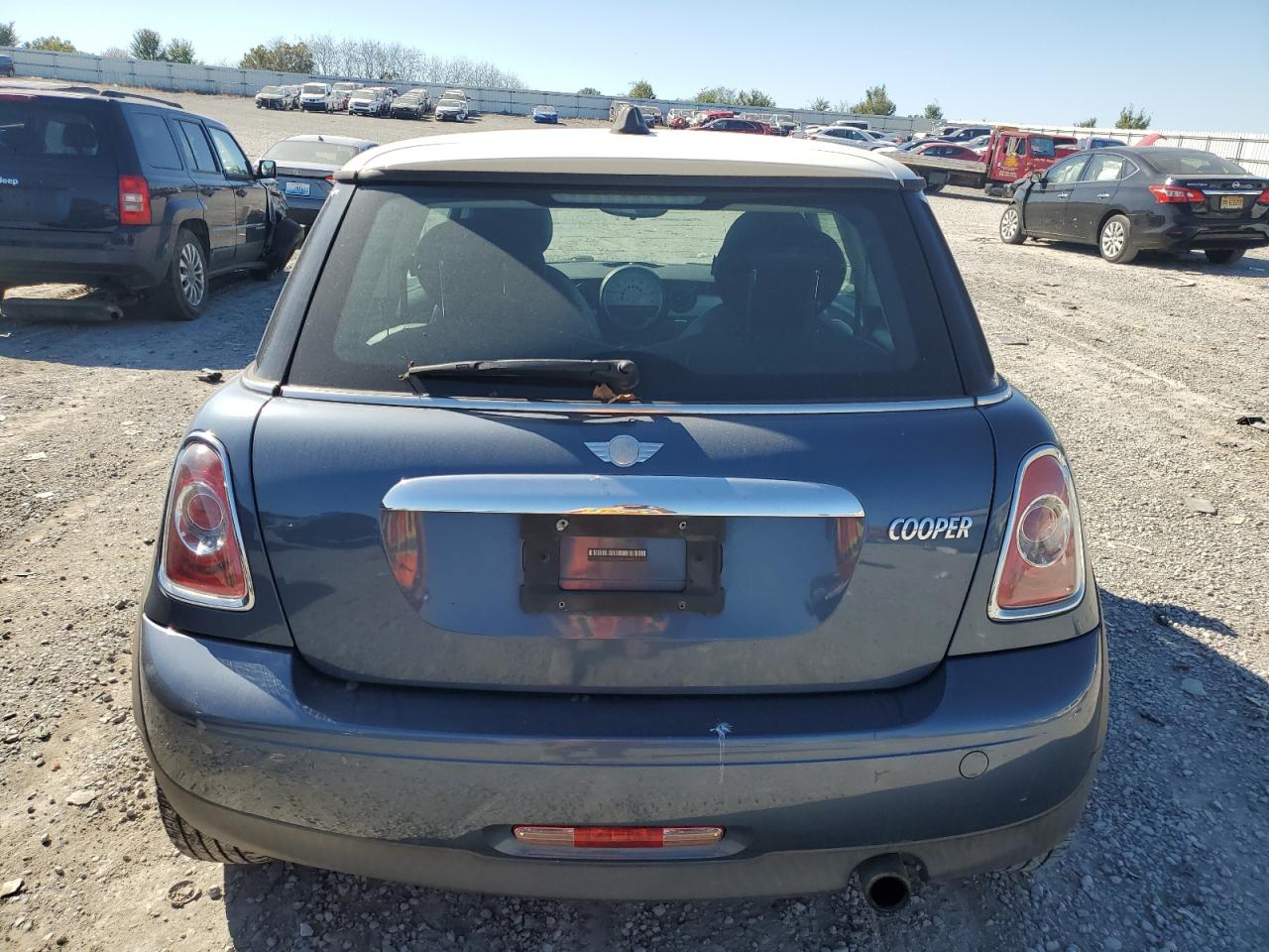 2011 Mini Cooper VIN: WMWSU3C59BT094447 Lot: 74190144