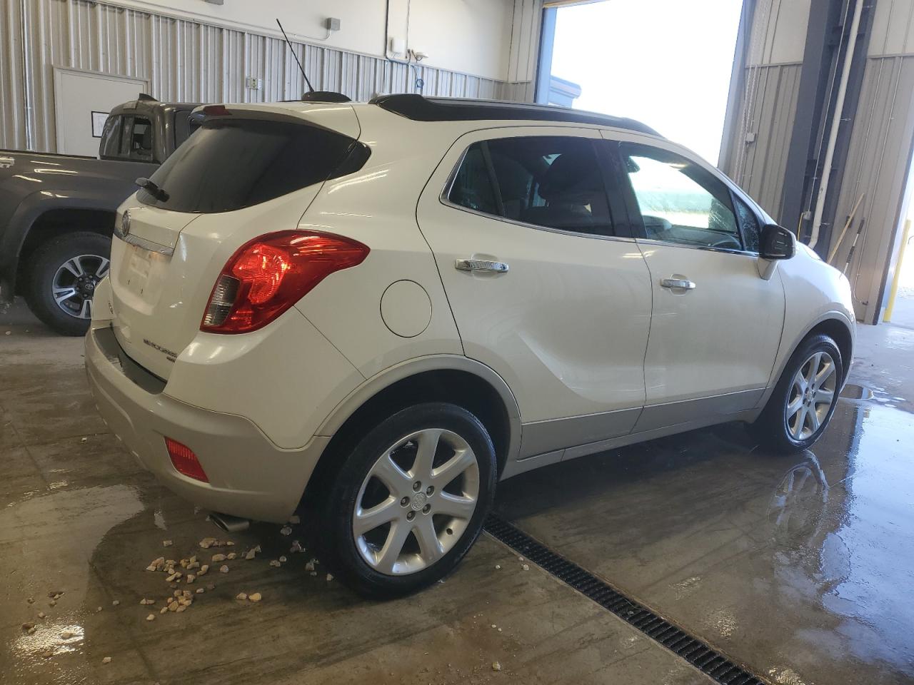 2015 BUICK ENCORE with FRONT END damage, VIN KL4CJGSB4FB252066