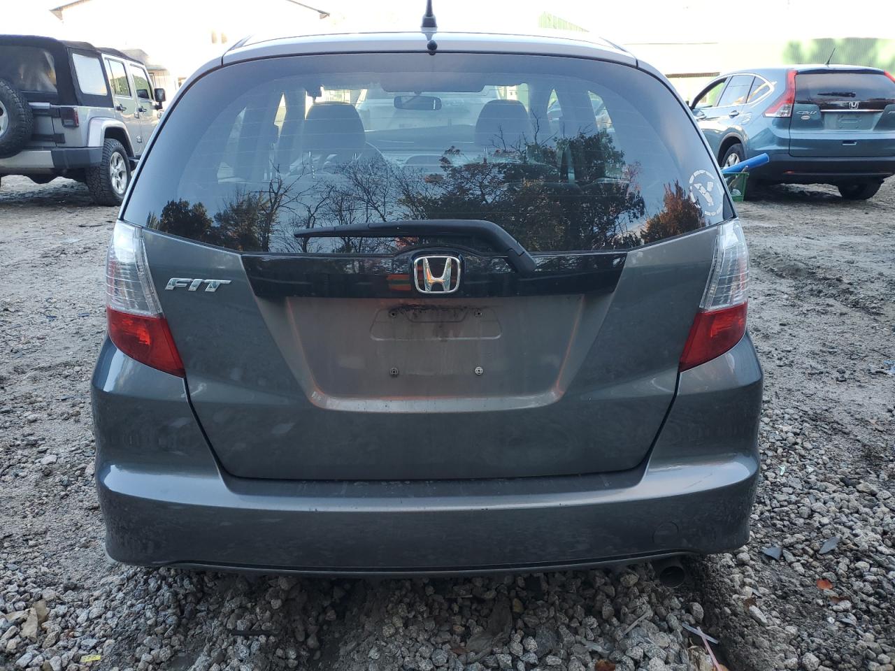 2011 Honda Fit VIN: JHMGE8H39BS010156 Lot: 75388564