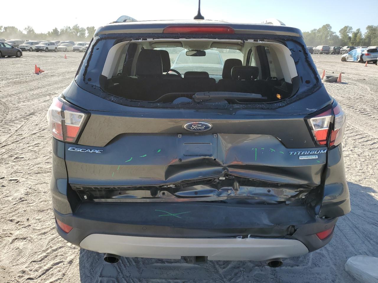 2018 Ford Escape Titanium VIN: 1FMCU0J93JUB04518 Lot: 77031684