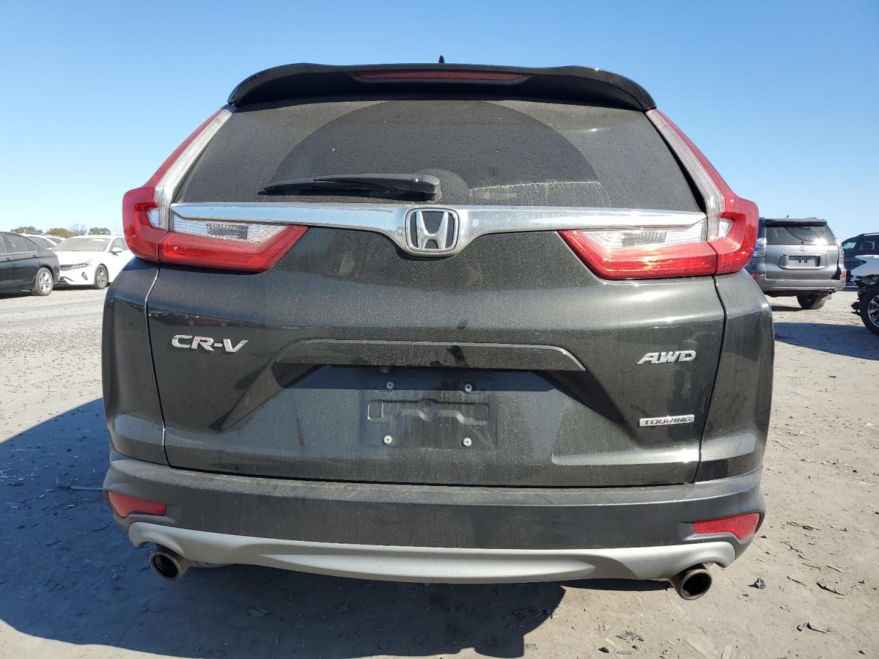 2018 Honda Cr-V Touring VIN: 7FARW2H92JE075231 Lot: 77615744