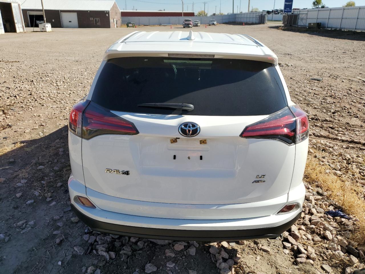 2018 Toyota Rav4 Le VIN: JTMBFREV6JJ209741 Lot: 76122884