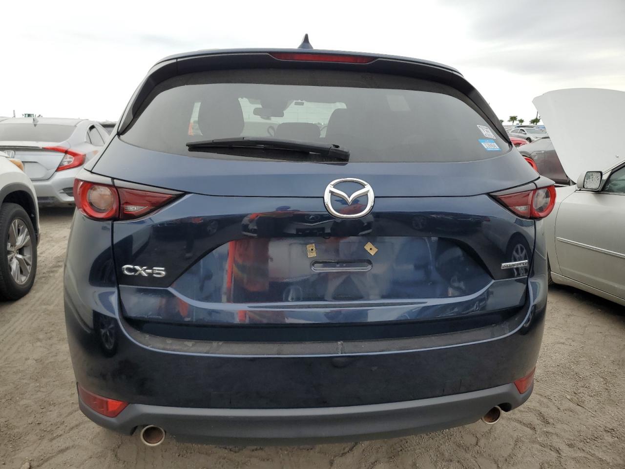 2021 Mazda Cx-5 Touring VIN: JM3KFACM9M1380958 Lot: 76243114