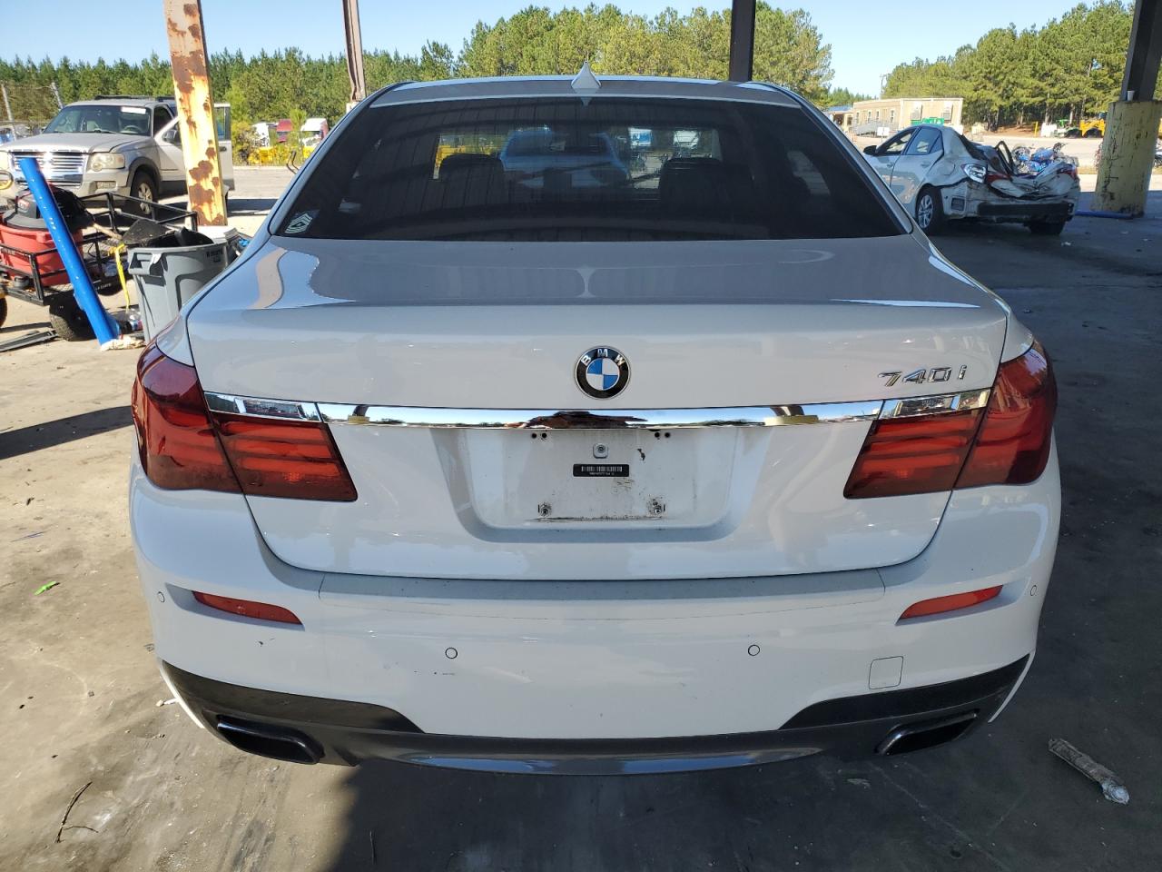 2014 BMW 740 I VIN: WBAYA6C59ED144122 Lot: 75059334