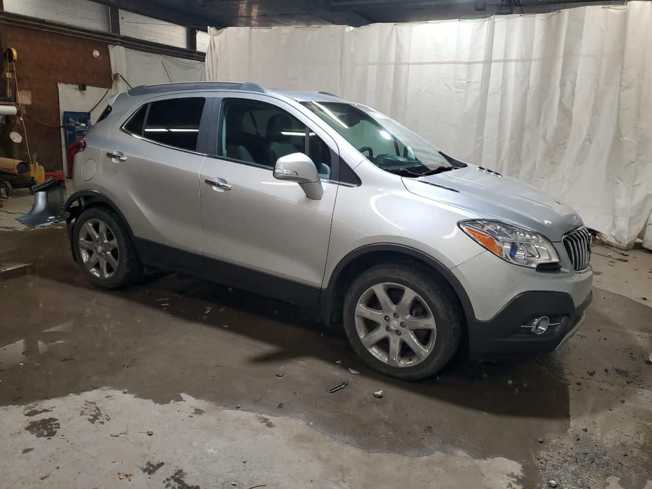 2015 BUICK ENCORE with REAR END damage, VIN KL4CJFSB2FB040311