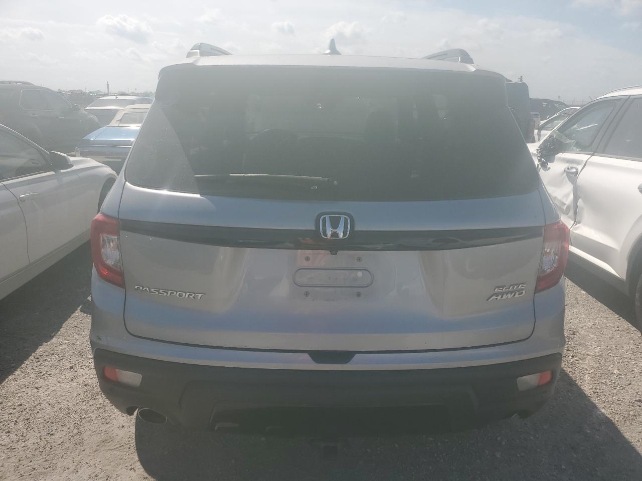 2019 Honda Passport Elite VIN: 5FNYF8H09KB009398 Lot: 74411524