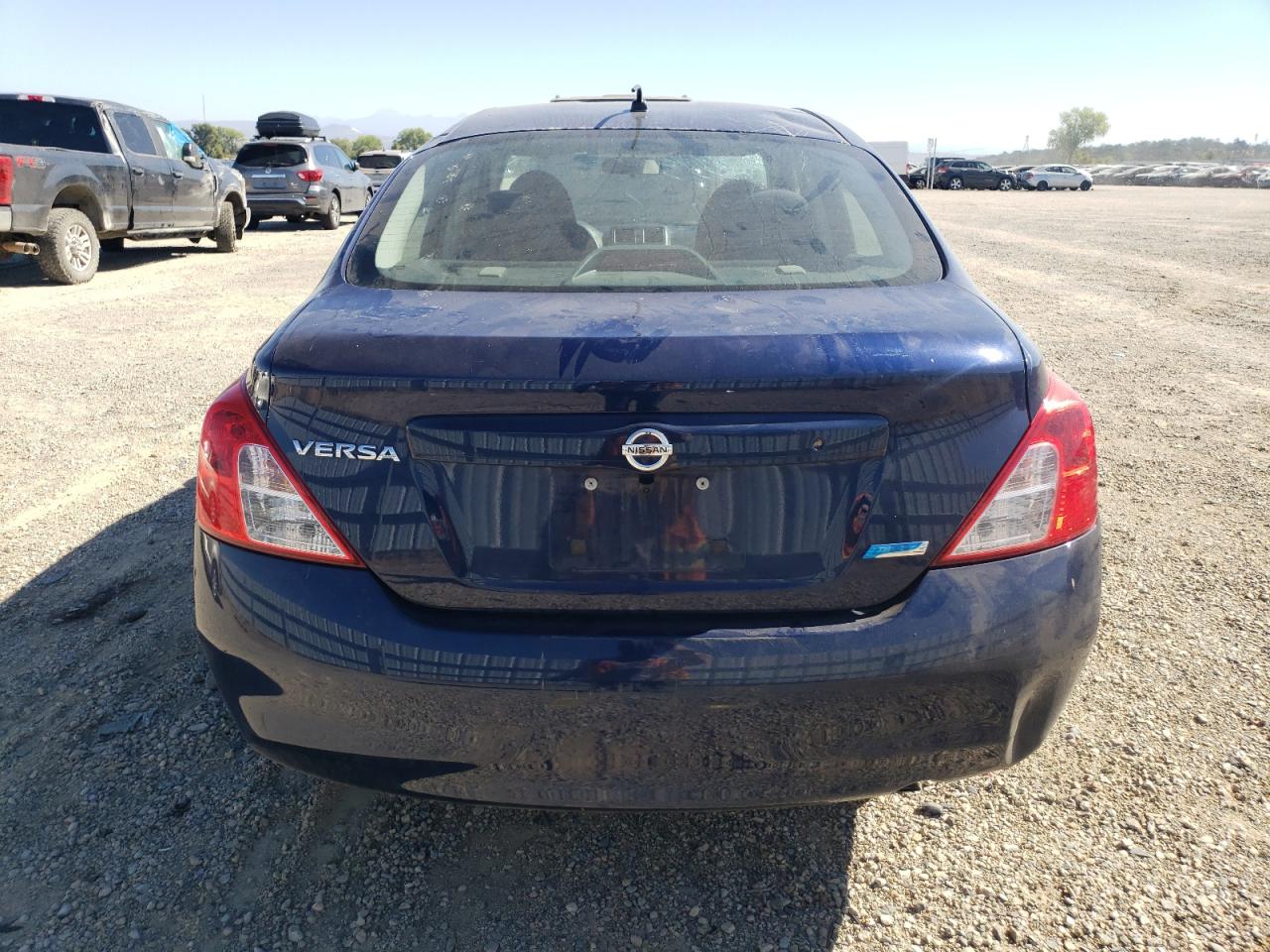 2014 Nissan Versa S VIN: 3N1CN7AP0EL869987 Lot: 74015124