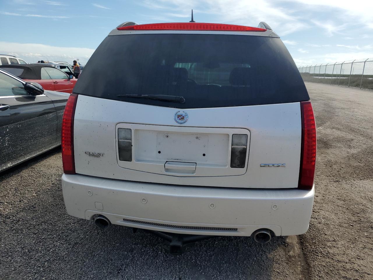 2009 Cadillac Srx VIN: 1GYEE637390103858 Lot: 75007174