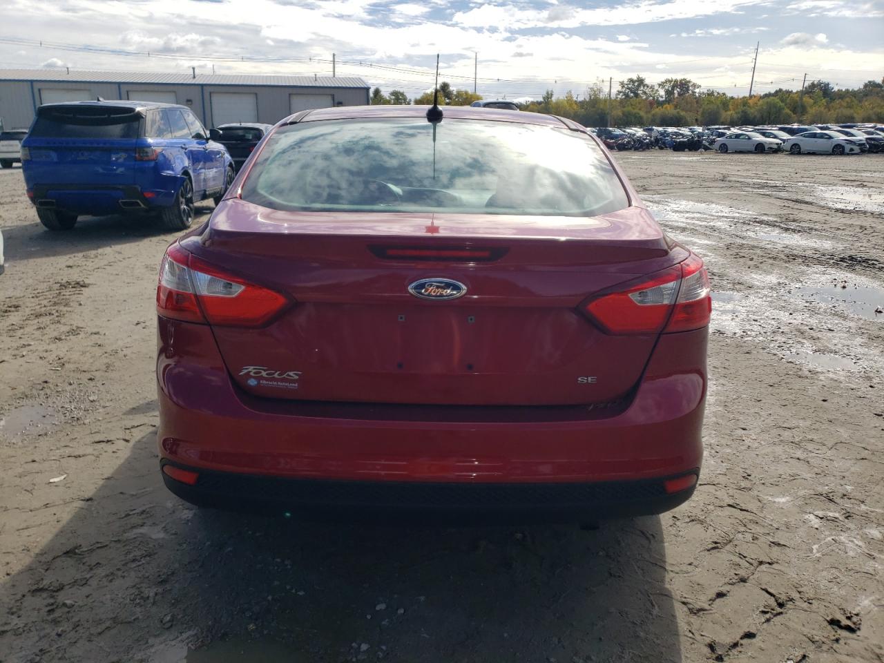 2014 Ford Focus Se VIN: 1FADP3F22EL125181 Lot: 76005754