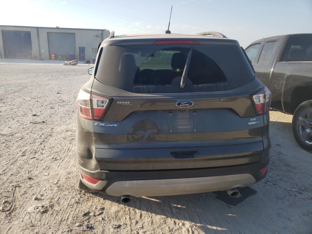 2018 Ford Escape Se VIN: 1FMCU9GD9JUD16064 Lot: 76165304